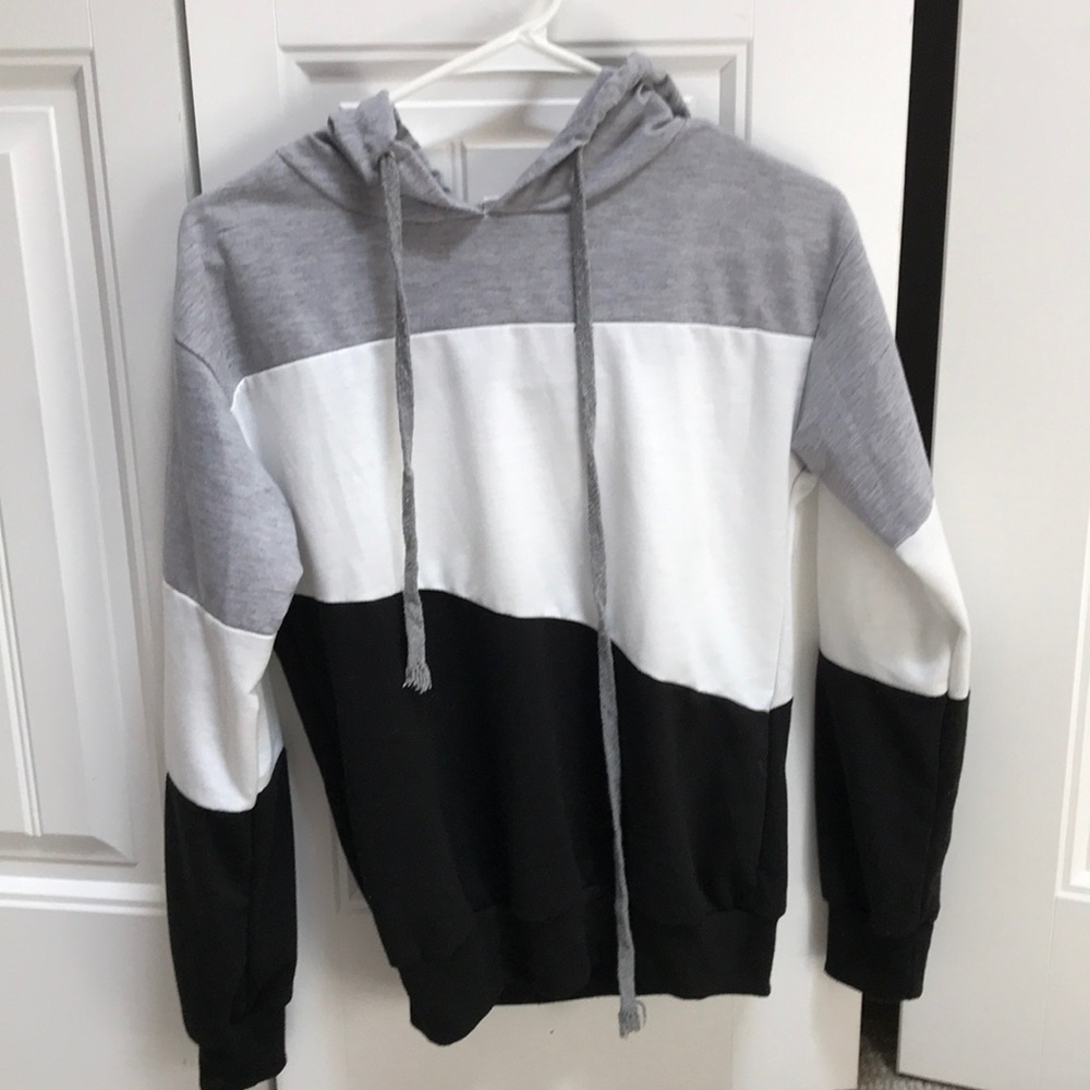 grey, black, and white sweatshirt